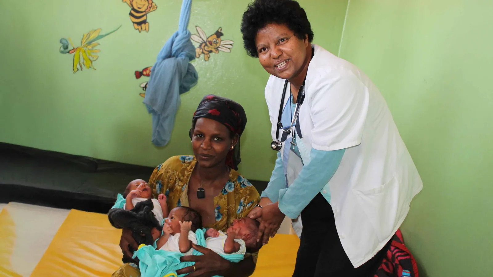 Sr. Nigist with a mother with triplets on discharge day